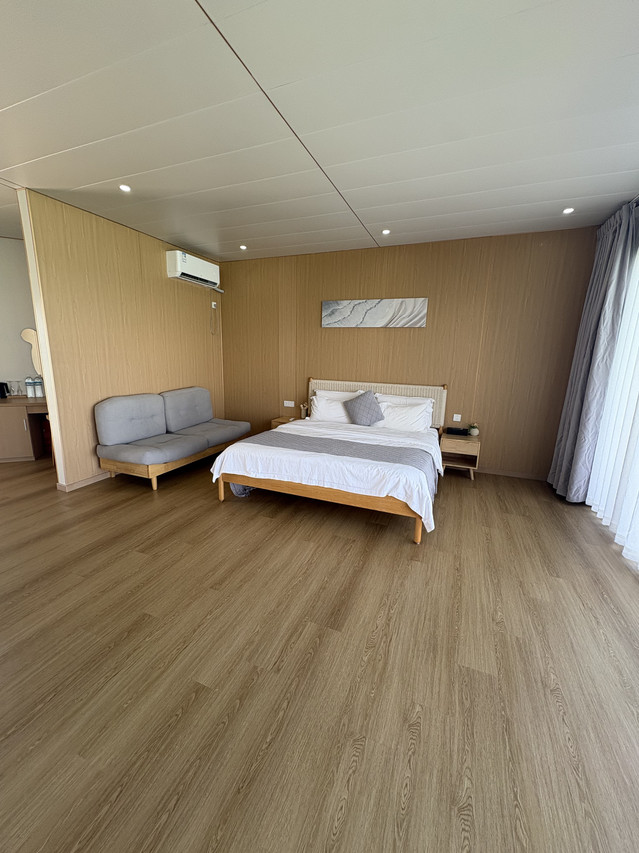 Spacious modern bedroom at Sicily Resort on the Celebes Sea