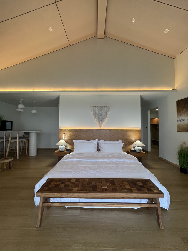 Stylish bedroom at Sicily Hotel in the Celebes Sea with boho-chic decor