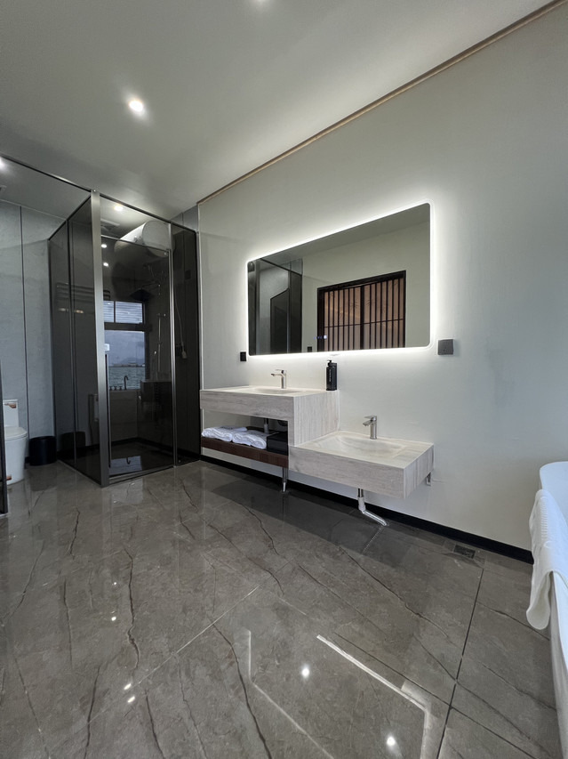 Sleek open bathroom space at Sicily Hotel near Bum Bum Island