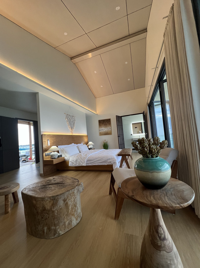 Sunlit bedroom at Sicily Resort near Tun Sakaran Marine Park facing the ocean
