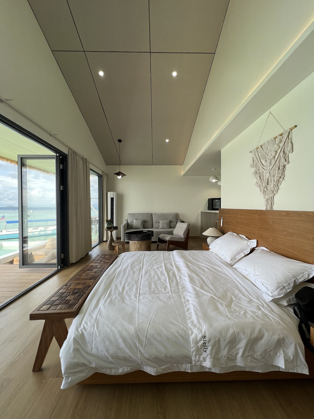 Stylish room at Sicily Resort highlighting open vanity design